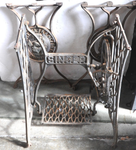 Lot 66 - Group lot - Old Cast iron Singer Sewing Machine Treadle base + pair cas