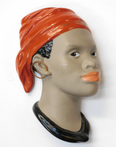 Lot 203 - Mid Century Ceramic Wall Plaque - Eastern lady with Orange head Scarf