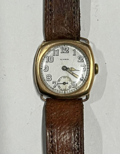 Lot 318 - 1930s Cyma 9ct rose gold Wrist watch (af) with original box