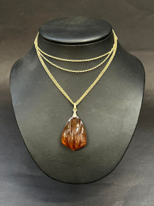 Lot 323 - Vintage Amber pendant - gpl silver Russian, marked 875 & long rope