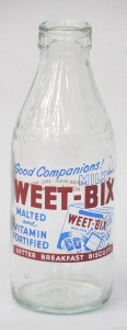 Lot 388 - Vintage 1 Pint Milk Bottle w Transfer printed Weet-Bix Advertising to