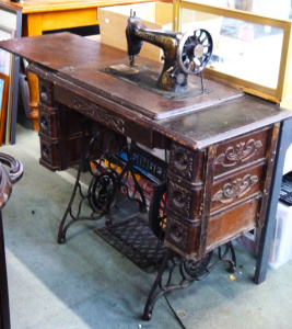 Lot 45 - Vintage Singer Treadle Sewing Machine with cast iron base (needs attent