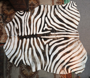 Lot 124 - Vintage Zebra-Skin Rug (some wear sighted), 190cm long