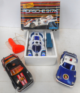 Lot 190 - 3 x vintage Porsche Battery-operated Remote-control Cars, one police a