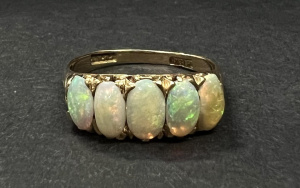 Lot 326 - c1900 18ct gold white solid opal ring with 5 oval opals - TW approx 3