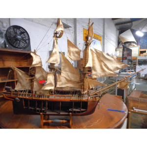 Lot 113 - Wooden Scale Model of the HMS Bounty, 1783 with cut-away hull, 90cm lo