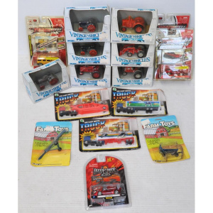 Lot 144 - Lot of Vintage Still Packaged Diecast Toy Vehicles incl ERTL Vintage V
