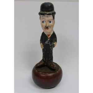 Lot 352 - Vintage c1920 30s Plaster ware Charlie Chaplin figure - mounted on wo