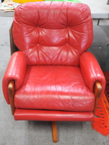 Lot 104 - Vintage 1980s Red Leather Pegar brand Swivel Arm Chair in the style of