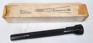 Lot 234 - Boxed vintage heavy metal Streamlight 35 Torch - black, made in Norris