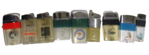 Lot 242 - Group Lot Various Novelty Cigarette Lighters - incl RAAF Darwin, Golfe