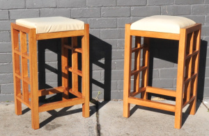 Lot 127 - Pair MCM light stained Oak Bar Stools - square design to legs, unbrand