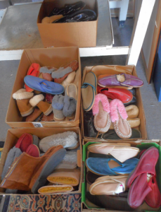 5 x Boxes as-new pairs of shoes - Ugg boots, moccasins, and slip-ons