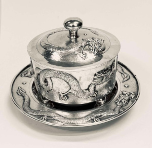 Yoksang Chinese export silver lidded container on stand with raised Dragon deco