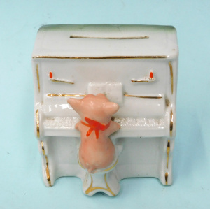 Victorian German Porcelain Fairing Moneybox featuring a Pig Playing the Piano -