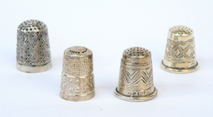 4 x Vintage sterling silver thimbles - varying pattterns - marks sighted 35gm T