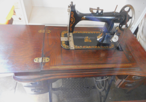 Vintage Tyanko Treadle Sewing Machine in 4-drawer Cabinet