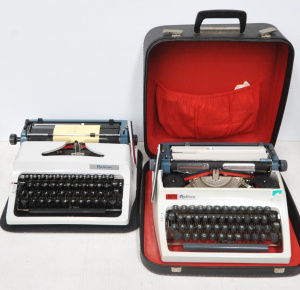 Lot 105 - 2 x vintage 1970s Optima brand Portable Typewriters - Cased Daro model