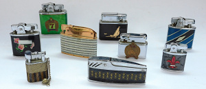 Lot 139 - Group lot of vintage Decorative Fuel Cigarette Lighters inc Omega Japa