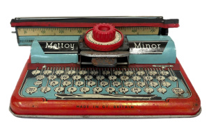 Lot 99 - 1950s Mettoy Minor tin toy Typewriter with ribbon - roller wheel missin