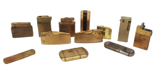 Lot 51 - Group lot - Vintage Brass & Gold Tone Gas & Fuel Cigarette Ligh