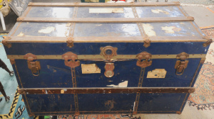 Lot 83 - Vintage Tin Blue Travelling trunk with Wooden banding and metal fitting