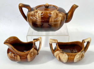 Lot 22 - Bendigo Pottery three pce Canadian Teaset - brown & cream treacle g