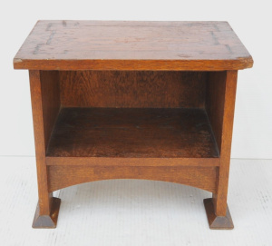 Lot 214 - Small Arts & Crafts Oak Shelf - inlaid design to top & sides,