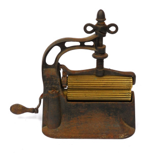 Lot 248 - Early 19th Century Cast iron hand Crank Crimper - Pleater with brass r