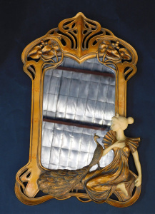 Lot 253 - Art Nouveau style mirror - carved top with kneeling lady with peacock