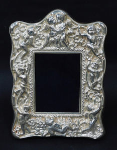 Lot 326 - 1988 Sheffield Hallmarked sterling silver photo frame with embossed wi