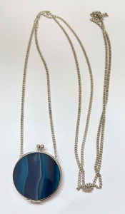 Lot 332 - Marbled blue Agate mirror compact pendant attached to long silver curb