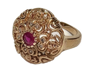 Lot 354 - Large 18ct rose gold Ring round filigree design with ruby to centre an